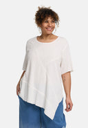 'Crissa' Tuniek – geplooid, licht & modern-asymmetrisch