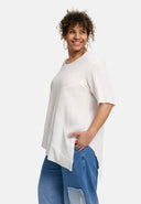 'Crissa' Tuniek – geplooid, licht & modern-asymmetrisch