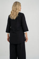 Blusa 'Saria' – assimétrica, leve e natural